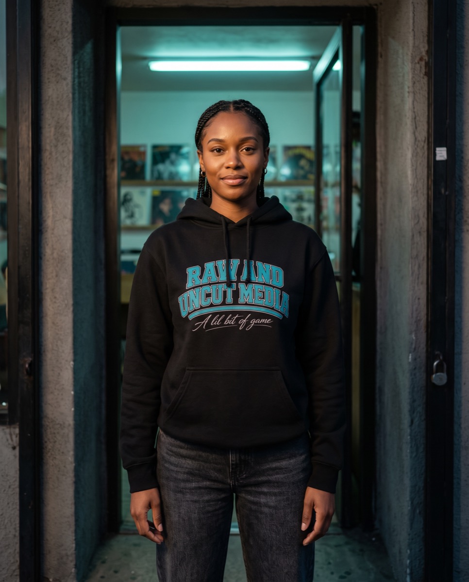 Model wearing the black Raw and Uncut graphic hoodie